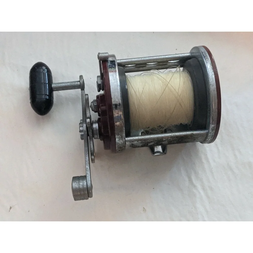 Penn Jigmaster 500 Fishing Reel Brown Sides Black Handle USA Working